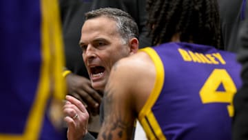 Mar 12, 2025; Nashville, TN, USA; LSU Tigers head coach Matt McMahon talks to his team during a time out against the Mississippi State Bulldogs during the first half at Bridgestone Arena. Mandatory Credit: Steve Roberts-Imagn Images