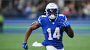 Oct 10, 2024; Seattle, Washington, USA; Seattle Seahawks wide receiver DK Metcalf (14) carries the ball after a catch during the first half against the San Francisco 49ers at Lumen Field. Mandatory Credit: Steven Bisig-Imagn Images