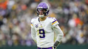 Nov 23, 2025; Green Bay, Wisconsin, USA;  Minnesota Vikings quarterback J.J. McCarthy (9) during the game against the Green Bay Packers at Lambeau Field. 