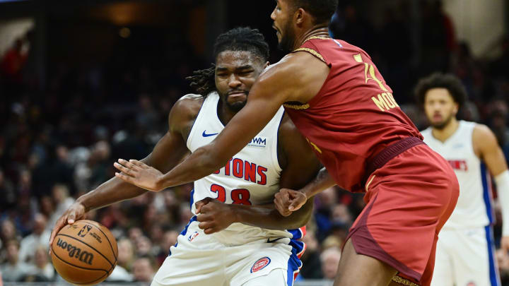 Nov 17, 2023; Cleveland, Ohio, USA; Detroit Pistons center Isaiah Stewart (28) drives to the basket against Cleveland Cavaliers forward Evan Mobley (4) during the second half at Rocket Mortgage FieldHouse. Mandatory Credit: Ken Blaze-USA TODAY Sports