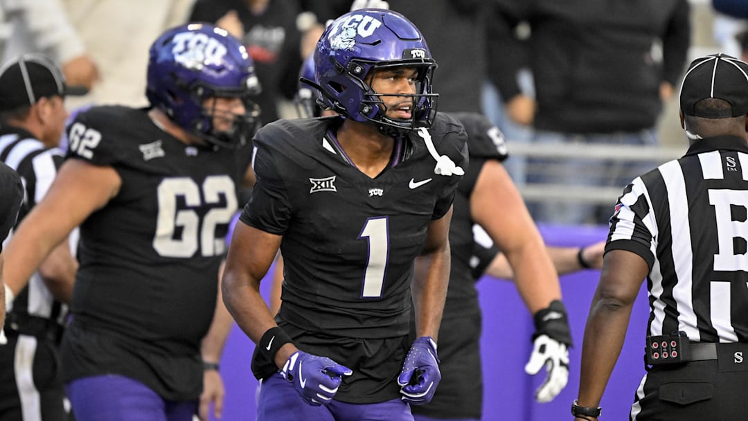 Nov 29, 2025; Fort Worth, Texas, USA; TCU Horned Frogs wide receiver Eric McAlister (1) scores a touchdown during the game between the Horned Frogs and the Bearcats at Amon G. Carter Stadium. Mandatory Credit: Jerome Miron-Imagn Images