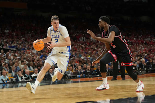Cooper Flagg dribbles the ball against Houston during the men's Final Four.