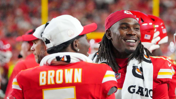 Aug 22, 2025; Kansas City, Missouri, USA; Kansas City Chiefs wide receiver Hollywood Brown (5) and wide receiver Rashee Rice (4) laugh on the sidelines against the Chicago Bears during the game at GEHA Field at Arrowhead Stadium. Mandatory Credit: Denny Medley-Imagn Images