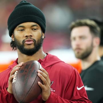 Aug 10, 2024; Glendale, Arizona, USA; Arizona Cardinals quarterback Kyler Murray throws on the sideline against the New Orleans Saints during the second half at State Farm Stadium. Mandatory Credit: Joe Camporeale-USA TODAY Sports