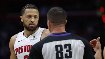 Oct 26, 2025; Detroit, Michigan, USA;  Detroit Pistons guard Cade Cunningham (2) talks to referee Andy Nagy in the first half against the Boston Celtics at Little Caesars Arena. Mandatory Credit: Rick Osentoski-Imagn Images
