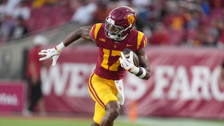 Aug 30, 2025; Los Angeles, California, USA; Southern California Trojans wide receiver Prince Strachan (17) carries the ball against the Missouri State Bears in the second half at United Airlines Field at Los Angeles Memorial Coliseum. Mandatory Credit: Kirby Lee-Imagn Images