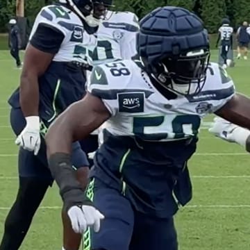 Seattle Seahawks outside linebacker Derick Hall rushes the passer during a drill at training camp.