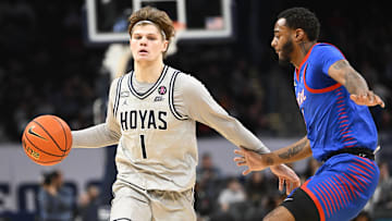 Jan 6, 2024; Washington, District of Columbia, USA; Georgetown Hoyas guard Rowan Brumbaugh (1) dribbles as DePaul Blue Demons guard Chico Carter Jr. (2) defends during the first half at Capital One Arena. 