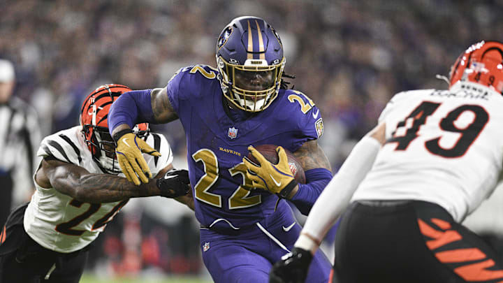 Derrick Henry carries the ball against the Cincinnati Bengals. Derrick Henry carries the ball against the Cincinnati Bengals.