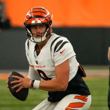 Cincinnati Bengals quarterback Joe Burrow (9) runs a drill during practice at the IEL Indoor Facility in downtown Cincinnati on Wednesday, Aug. 28, 2024.