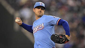 Texas Rangers starting pitcher Tyler Mahle (51) pitches
