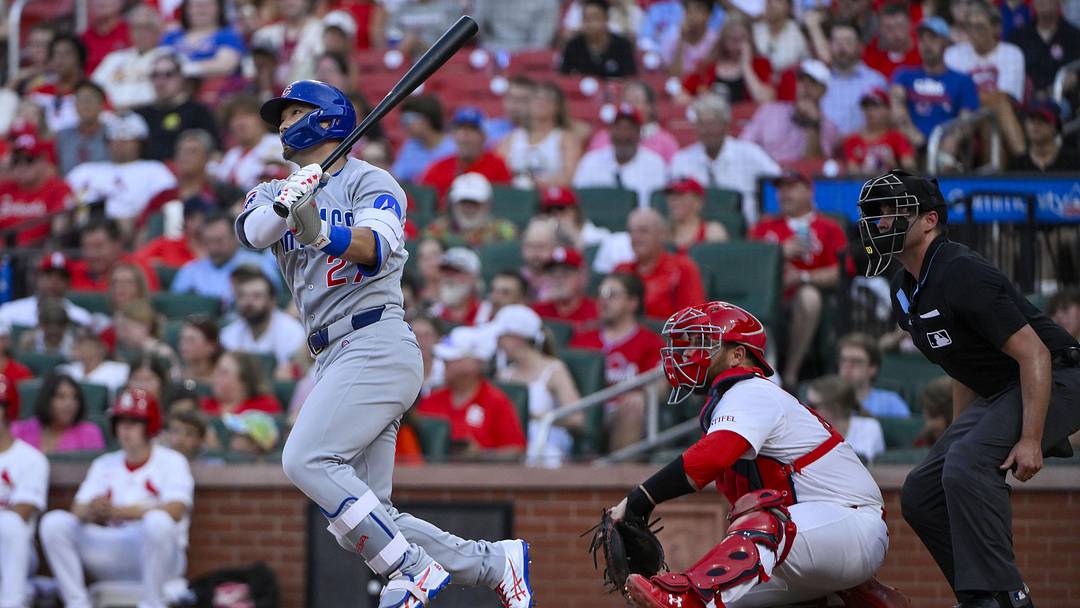 Chicago Cubs left fielder Seiya Suzuki hits against the St. Louis Cardinals.