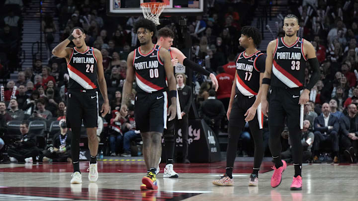 Jan 14, 2025; Portland, Oregon, USA; Portland Trail Blazers (from left to right) Kris Murray (24), Scoot Henderson (00), Donovan Clingan (23), Shaedon Sharpe (17) and Toumani Camara (33) walk back to the court after a timeout during the second half against the Brooklyn Nets at Moda Center. Mandatory Credit: Soobum Im-Imagn Images Jan 14, 2025; Portland, Oregon, USA; Portland Trail Blazers (from left to right) Kris Murray (24), Scoot Henderson (00), Donovan Clingan (23), Shaedon Sharpe (17) and Toumani Camara (33) walk back to the court after a timeout during the second half against the Brooklyn Nets at Moda Center. Mandatory Credit: Soobum Im-Imagn Images
