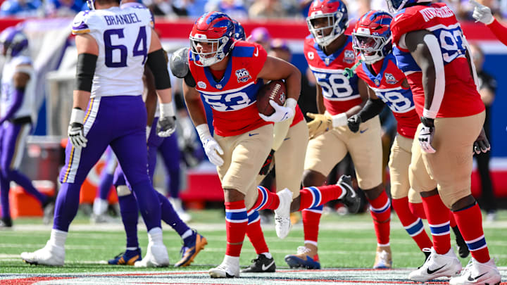 Sep 8, 2024; East Rutherford, New Jersey, USA; New York Giants linebacker Darius Muasau (53) reacts after an interception against the Minnesota Vikings during the second half at MetLife Stadium.  