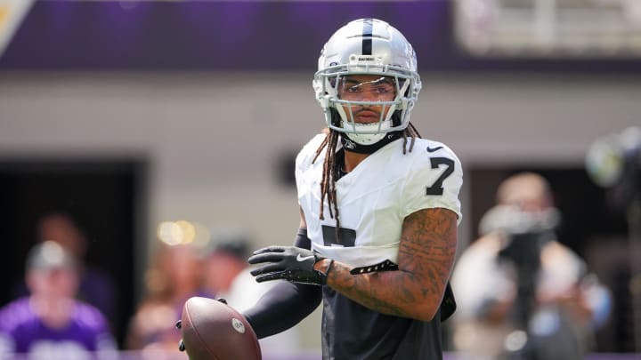 Aug 10, 2024; Minneapolis, Minnesota, USA; Las Vegas Raiders safety Tre'von Moehrig (7) warms up before the game against the Minnesota Vikings  at U.S. Bank Stadium. Mandatory Credit: Brad Rempel-USA TODAY Sports