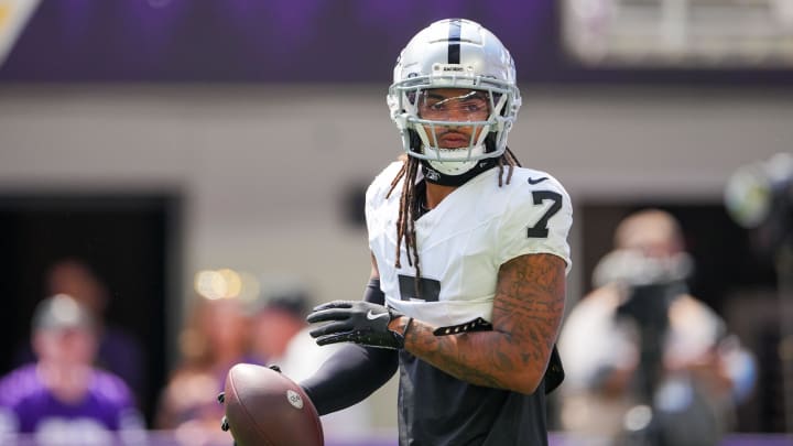 Aug 10, 2024; Minneapolis, Minnesota, USA; Las Vegas Raiders safety Tre'von Moehrig (7) warms up before the game against the Minnesota Vikings  at U.S. Bank Stadium. Mandatory Credit: Brad Rempel-USA TODAY Sports