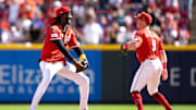 Cincinnati Reds shortstop Elly De La Cruz (44) and Cincinnati Reds second baseman Matt McLain (9) after the Cincinnati Reds defeat New York Mets 3-2 at Great American Ball Park in Cincinnati on Sept. 7, 2025.