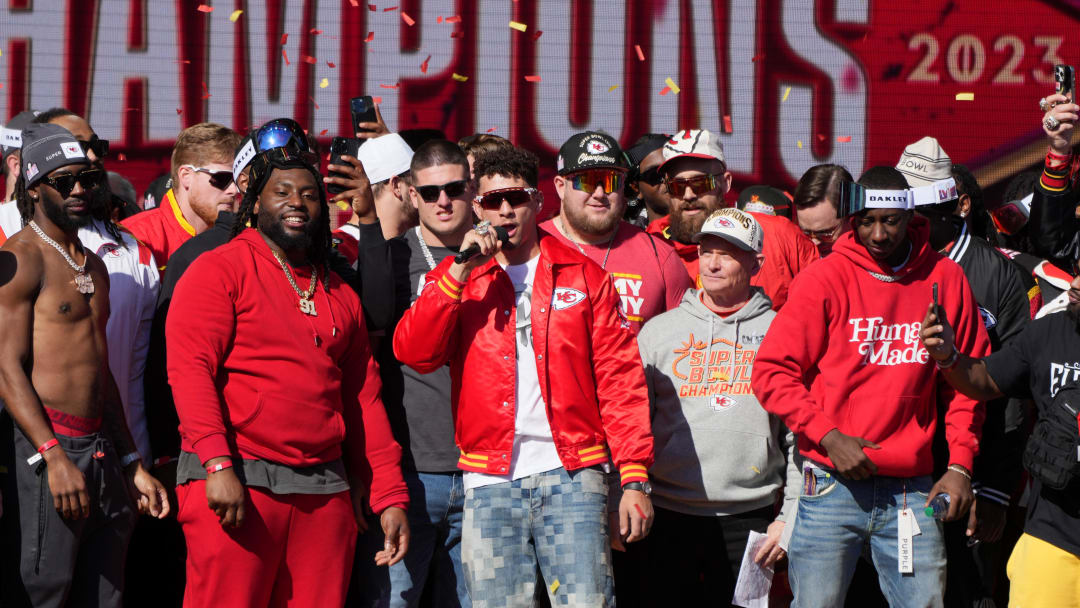 Feb 14, 2024; Kansas City, MO, USA;  Kansas City Chiefs quarterback Patrick Mahomes (15) addresses the crowd on stage during the celebration of the Kansas City Chiefs winning Super Bowl LVIII. Mandatory Credit: Kirby Lee-USA TODAY Sports