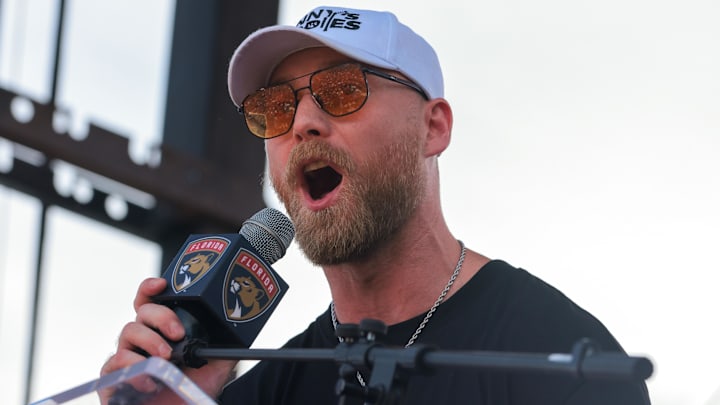 Jun 22, 2025; Fort Lauderdale, Florida, UNITED STATES; Florida Panthers center Sam Bennett (9) speaks to the fans during the Stanley Cup championship parade and rally. Mandatory Credit: Sam Navarro-Imagn Images Jun 22, 2025; Fort Lauderdale, Florida, UNITED STATES; Florida Panthers center Sam Bennett (9) speaks to the fans during the Stanley Cup championship parade and rally. Mandatory Credit: Sam Navarro-Imagn Images