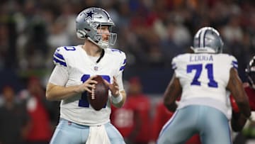 Dec 22, 2024; Arlington, Texas, USA; Dallas Cowboys quarterback Cooper Rush (10) throws a pass against the Tampa Bay Buccaneers in the first quarter at AT&T Stadium. Mandatory Credit: Tim Heitman-Imagn Images