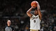 Purdue Boilermakers guard C.J. Cox (0) shoots the ball 