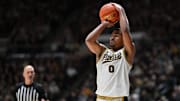 Purdue Boilermakers guard C.J. Cox (0) shoots the ball