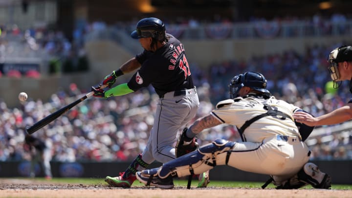 Aug 11, 2024; Minneapolis, Minnesota, USA; Cleveland Guardians third baseman Jose Ramirez (11) hits a solo home run during the fourth inning against the Minnesota Twins at Target Field. Mandatory Credit: Jordan Johnson-USA TODAY Sports