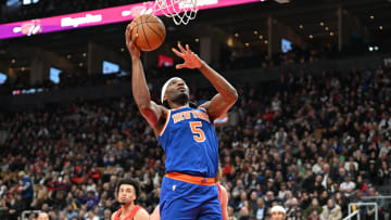 Mar 27, 2024; Toronto, Ontario, CAN;  New York Knicks forward Precious Achiuwa (5) shoots the ball against the Toronto Raptors in the first half at Scotiabank Arena. Mandatory Credit: Dan Hamilton-USA TODAY Sports