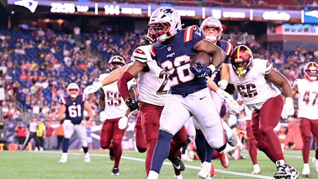 New England Patriots running back Terrell Jennings (26) scores a touchdown.