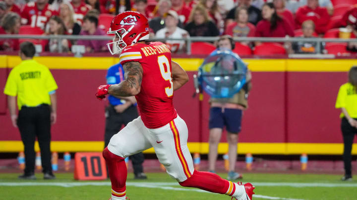 Aug 22, 2024; Kansas City, Missouri, USA; Kansas City Chiefs running back Louis Rees-Zammit (9) returns a kick against the Chicago Bears during the second half at GEHA Field at Arrowhead Stadium. 