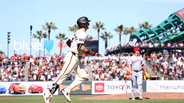 San Francisco Giants right fielder Mike Yastrzemski (5) rounds the bases ahead of Cincinnati Reds relief pitcher Emilio Pagan (15) on two-run RBI home run for a walk-off win during the tenth inning at Oracle Park. San Francisco Giants right fielder Mike Yastrzemski (5) rounds the bases ahead of Cincinnati Reds relief pitcher Emilio Pagan (15) on two-run RBI home run for a walk-off win during the tenth inning at Oracle Park.