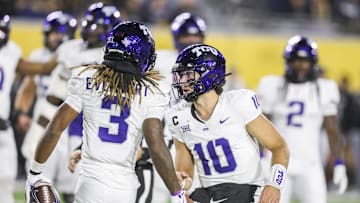 Oct 25, 2025; Morgantown, West Virginia, USA; Texas Christian University Horned Frogs quarterback Josh Hoover (10) celebrates with wide receiver Major Everhart (3) after a catch during the fourth quarter against the West Virginia Mountaineers at Milan Puskar Stadium. Mandatory Credit: Ben Queen-Imagn Images