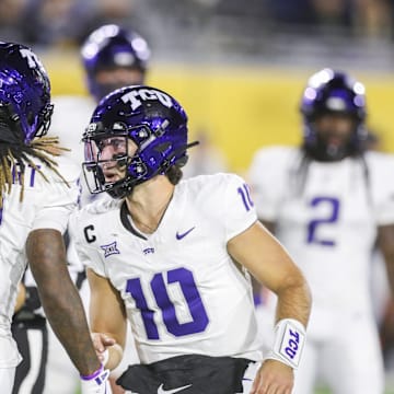 Oct 25, 2025; Morgantown, West Virginia, USA; Texas Christian University Horned Frogs quarterback Josh Hoover (10) celebrates with wide receiver Major Everhart (3) after a catch during the fourth quarter against the West Virginia Mountaineers at Milan Puskar Stadium. Mandatory Credit: Ben Queen-Imagn Images