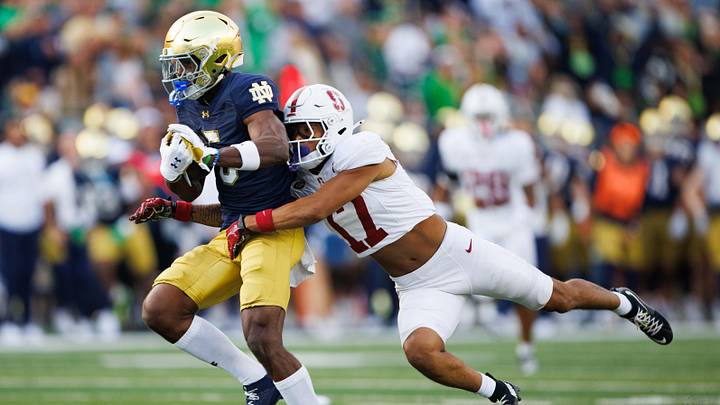 Stanford cornerback Jshawn Frausto-Ramos (17) tackles Notre Dame wide receiver Beaux Collins (5) during a NCAA college football game between Notre Dame and Stanford at Notre Dame Stadium on Saturday, Oct. 12, 2024, in South Bend.