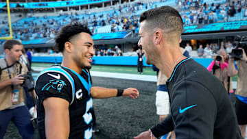 Nov 3, 2024; Charlotte, North Carolina, USA; Carolina Panthers quarterback Bryce Young (9) with head coach Dave Canales after the game at Bank of America Stadium. Mandatory Credit: Bob Donnan-Imagn Images