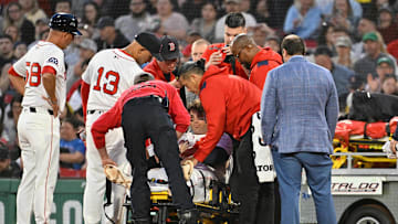 May 2, 2025; Boston, Massachusetts, USA; Boston Red Sox first baseman Triston Casas (36) is taken off the field on a stretcher during the second inning against the Minnesota Twins at Fenway Park. 