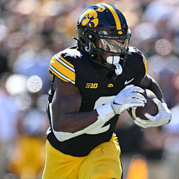 Sep 7, 2024; Iowa City, Iowa, USA; Iowa Hawkeyes running back Kaleb Johnson (2) runs for a 27 yard touchdown against the Iowa State Cyclones during the first quarter at Kinnick Stadium. Mandatory Credit: Jeffrey Becker-Imagn Images