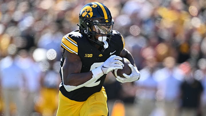 Sep 7, 2024; Iowa City, Iowa, USA; Iowa Hawkeyes running back Kaleb Johnson (2) runs for a 27 yard touchdown against the Iowa State Cyclones during the first quarter at Kinnick Stadium. Mandatory Credit: Jeffrey Becker-Imagn Images