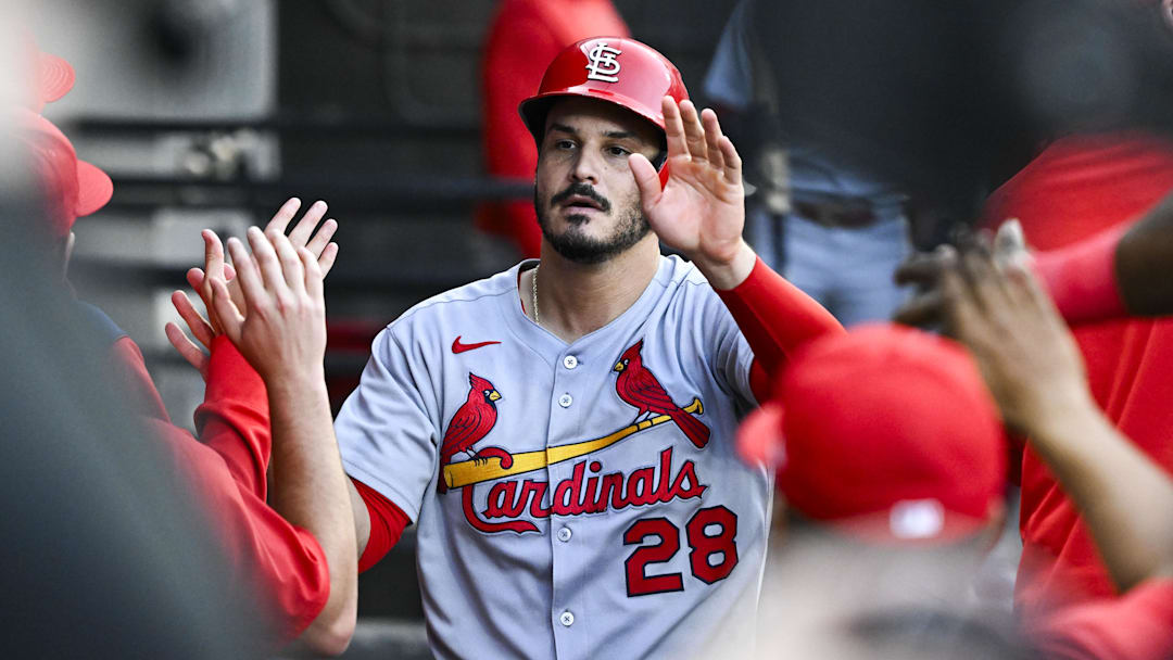 Jun 17, 2025; Chicago, Illinois, USA;  St. Louis Cardinals third baseman Nolan Arenado (28) celebrates in the dugout after he scores during the second inning against the Chicago White Sox at Rate Field. Mandatory Credit: Matt Marton-Imagn Images