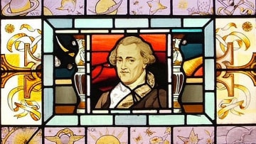 A stained-glass window at the Coats Observatory near Glasgow, Scotland, depicts William Herschel.
