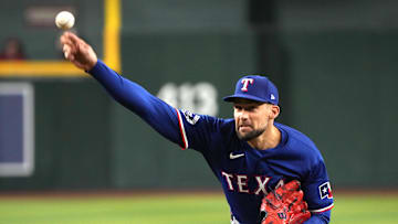 Sep 10, 2024; Phoenix, Arizona, USA; Texas Rangers pitcher Nathan Eovaldi (17) throws against the Arizona Diamondbacks in the first inning at Chase Field. 