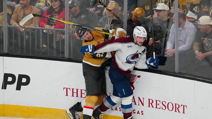 May 26, 2026; Las Vegas, Nevada, USA; Colorado Avalanche defenseman Cale Makar (8) defends against Vegas Golden Knights center Brett Howden (21) during the third period in game four of the Western Conference Final of the 2026 Stanley Cup Playoffs at T-Mobile Arena. Mandatory Credit: Stephen R. Sylvanie-Imagn Images