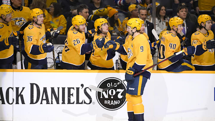 Feb 27, 2025; Nashville, Tennessee, USA;  Nashville Predators left wing Filip Forsberg (9) celebrates his goal with his teammates against the Winnipeg Jets during the first period at Bridgestone Arena. Mandatory Credit: Steve Roberts-Imagn Images