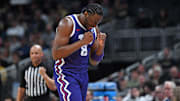 Mar 22, 2024; Indianapolis, IN, USA; TCU Horned Frogs center Ernest Udeh Jr. (8) reacts after a play in the first round of the 2024 NCAA Tournament at Gainbridge FieldHouse. Mandatory Credit: Robert Goddin-Imagn Images