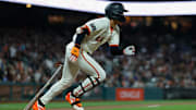 May 19, 2025; San Francisco, California, USA; San Francisco Giants center fielder Jung Hoo Lee (51) hits an rbi double during the eighth inning against the Kansas City Royals at Oracle Park.