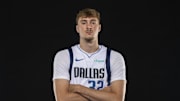 Sep 29, 2025; Dallas, TX, USA; Dallas Mavericks forward Cooper Flagg (32) poses for a photo during the Mavericks 2025 media day at the American Airlines Center. Mandatory Credit: Jerome Miron-Imagn Images