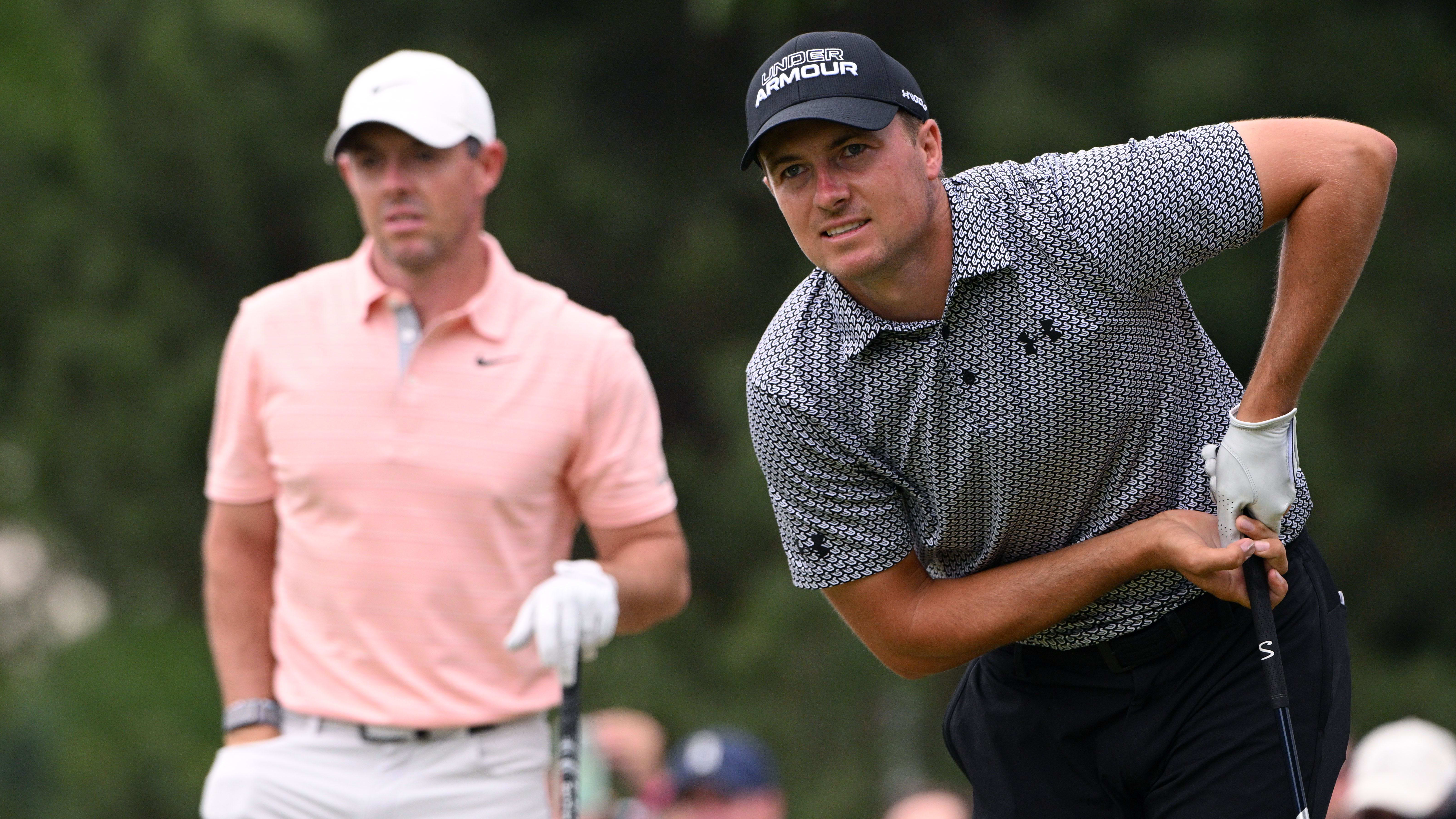 Rory McIlroy (left) and Jordan Spieth are pictured at the 2022 PGA Championship.