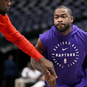 Apr 11, 2025; Dallas, Texas, USA; Toronto Raptors guard Jamal Shead (23) warms up before the game against the Dallas Mavericks at the American Airlines Center. Mandatory Credit: Jerome Miron-Imagn Images