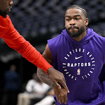 Apr 11, 2025; Dallas, Texas, USA; Toronto Raptors guard Jamal Shead (23) warms up before the game against the Dallas Mavericks at the American Airlines Center. Mandatory Credit: Jerome Miron-Imagn Images