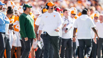 Jan 1, 2024; Orlando, FL, USA; Tennessee Volunteers head coach Josh Heupel walks the sideline against the Iowa Hawkeyes in the second quarter at Camping World Stadium. Mandatory Credit: Jeremy Reper-USA TODAY Sports